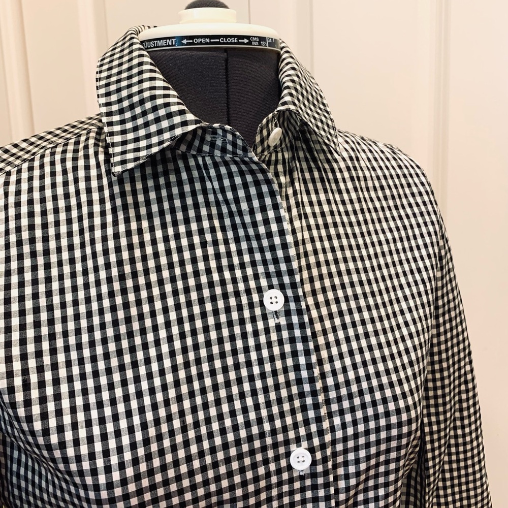 100% silk button up blouse.